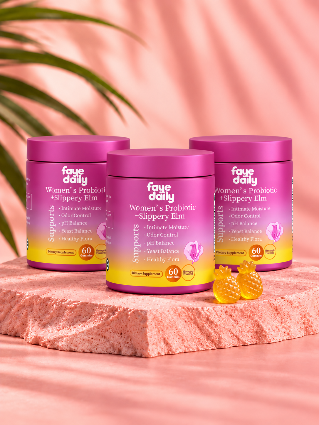 Three jars of Faye Daily Women's Probiotic + Slippery Elm Gummies with pineapple gummies